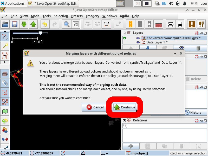 Screenshot of the inkscape application showing a popup titled "Merging layers with different upload policies" and the "Continue" button highlighted.